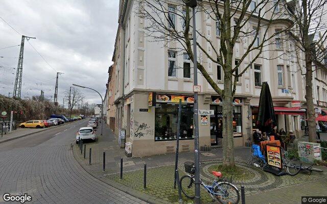 Straßenansicht Palmen Grill